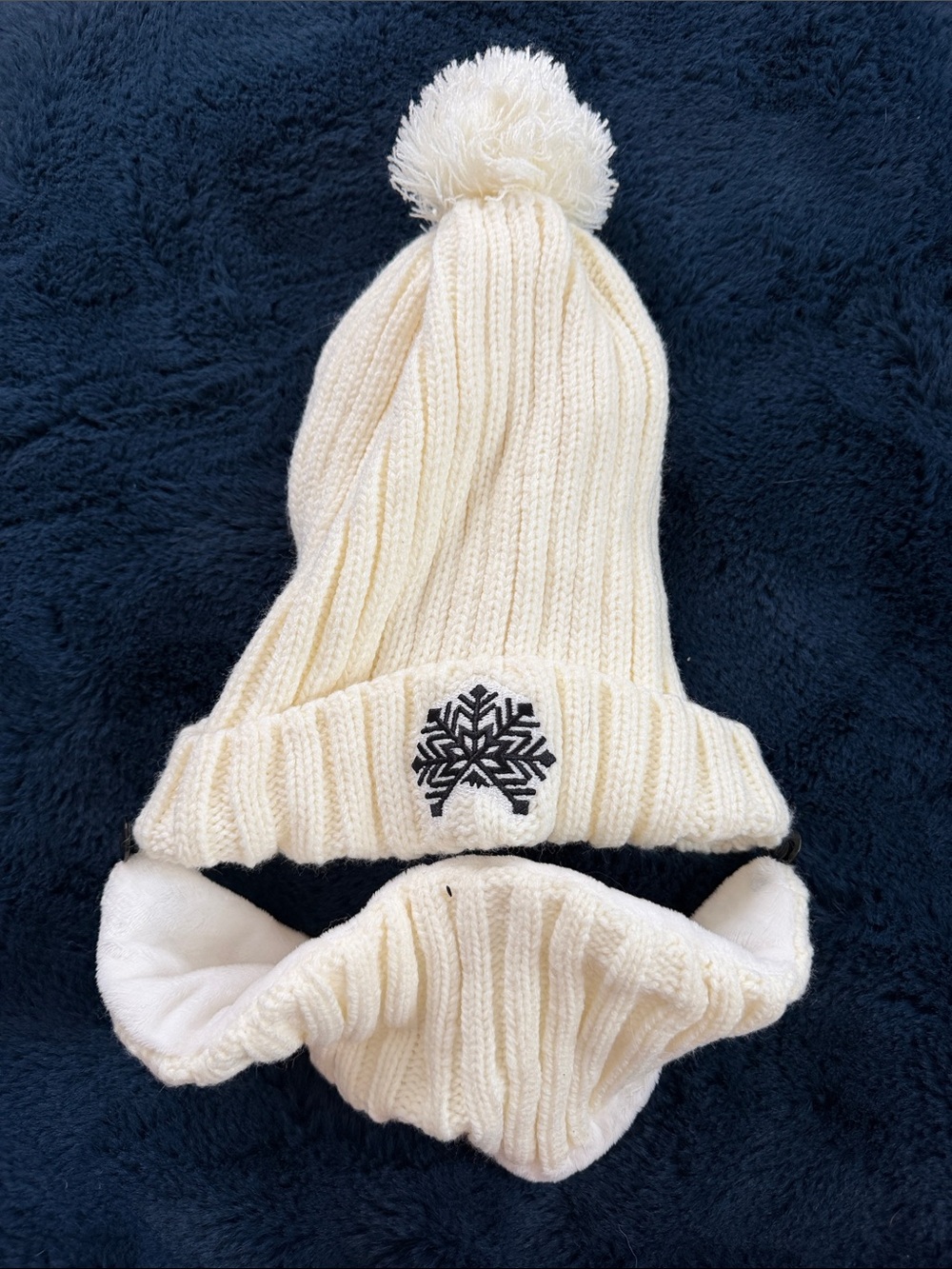 Kids Cream Knit Pom-Pom Beanie with Ear Flaps and Snowflake Detail